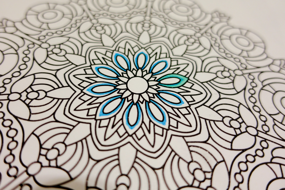Coloring over and blending with the lighter shade.